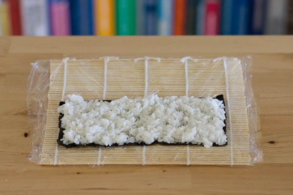 Spread rice in an even, thin layer.